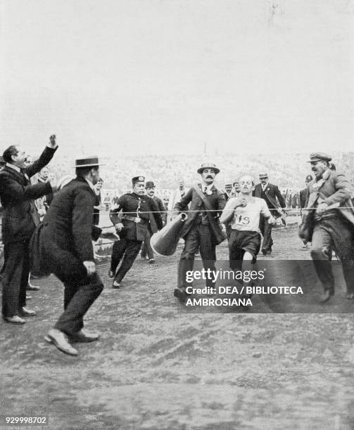 Dorando Pietri crossing the line first in the marathon at the London Olympics, July 24 England, photograph by Fiorilli, from L'Illustrazione...