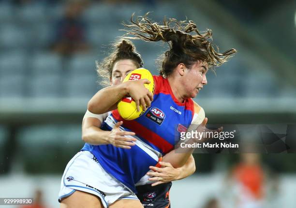 Jodie Hicks of the Giants tackles Bonnie Toogood of the Bulldogs during the round six AFLW match between the Greater Western Sydney Giants and the...