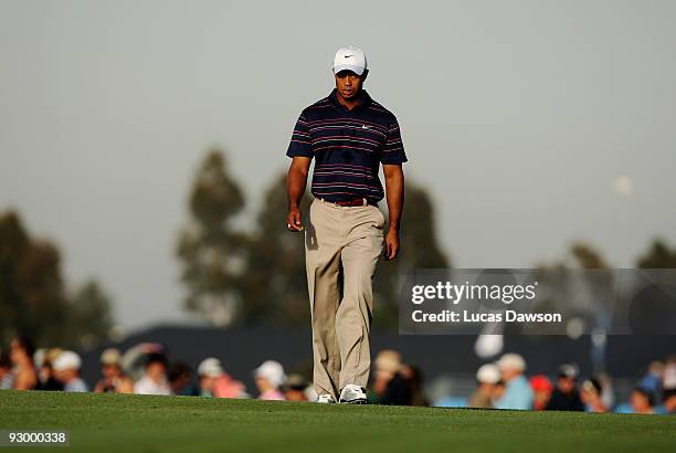 Tiger Woods of the USA walks the fairway on the 10th hole during round one of the 2009 Australian Masters at Kingston Heath Golf Club on November 12,...