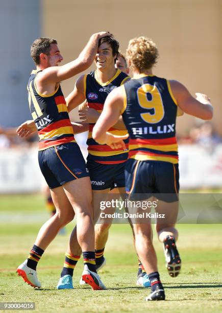 Darcy Fogarty of the Crows celebrates after kicking a goal during the JLT Community Series AFL match between Port Adelaide Power and the Adelaide...