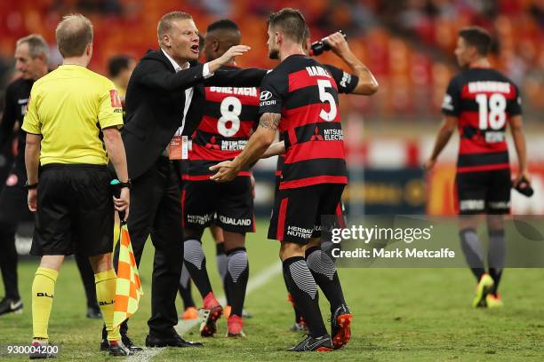 Brendan Hamill of the Wanderers celebrates scoring a goal with Wanderers coach Josep Gombau during the round 22 A-League match between the Western...