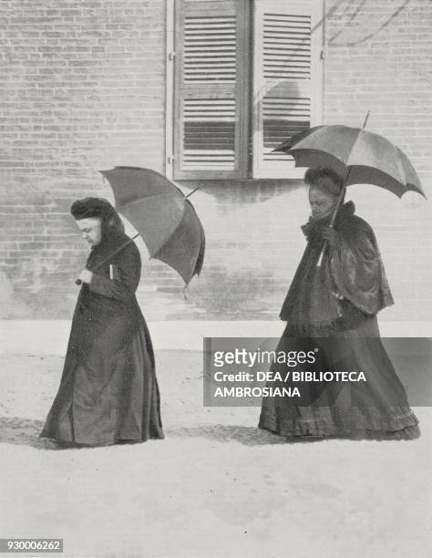 Princess Maria Clotilde of Savoy , followed by the Countess Irene Galleani d'Agliano, at the weeding of her son Vittorio Napoleon Bonaparte with...