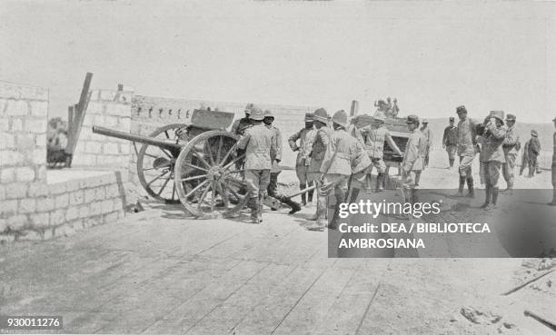 Field gun in action at Gargaresch, Battle of Zanzur , June 8 Libya, Italian-Turkish war, photograph by Mario Corsi, from L'Illustrazione Italiana,...