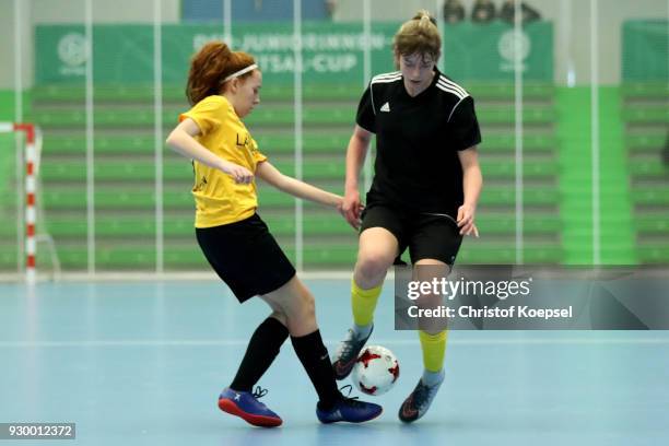 Leonie Biehl of Saarbruecken challenges Lara Klitzsch of Zwickau during the Group A match between 1. FC Saarbruecken and DFC Westsachsen Zwickau 0-1...