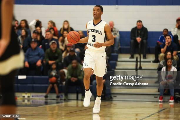 Cassius Stanley of Sierra Canyon handles the ball as Sierra Canyon plays Foothills Christian for the CIF Open Division Playoffs at Sierra Canyon High...