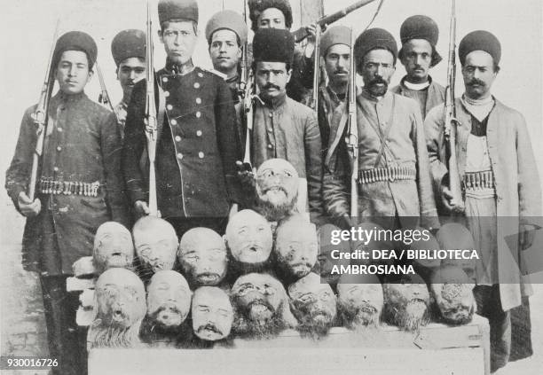 Government soldiers displaying the heads of some Arshad al- Dowleh's Turkmen, Persian constitutional revolution, Iran, photograph by G C Montagna,...