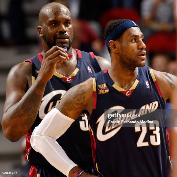 Shaquille O'Neal and LeBron James of the Cleveland Cavaliers react during the game against the Orlando Magic on November 11, 2009 at Amway Arena in...