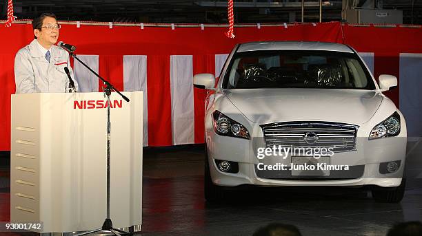 Nissan's Chief Operating Officer, Yoshiyuki Shiga speaks during the off line ceremony for the latest FUGA motor car at the Tochigi Plant on November...