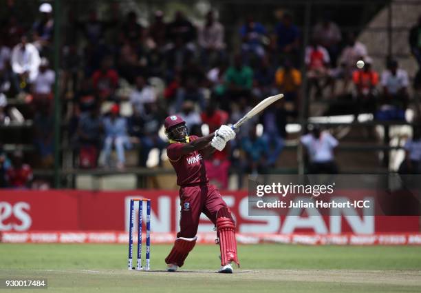 Rovman Powell of The West Indies hits out during The ICC Cricket World Cup Qualifier between The West Indies and Ireland at The Harare Sports Club on...