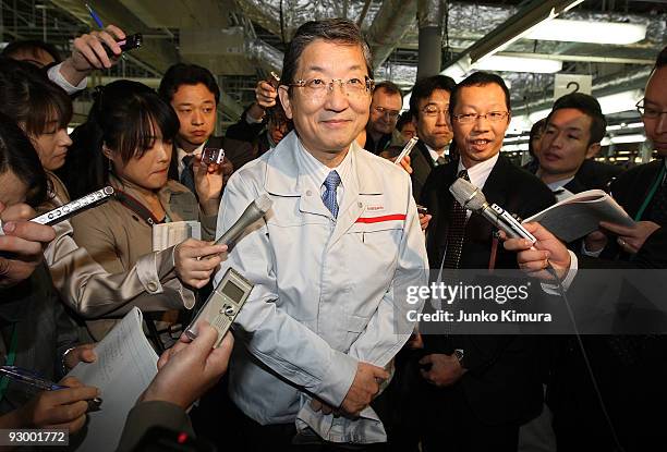 Nissan's Chief Operating Officer, Yoshiyuki Shiga talks to reporters at the off line ceremony for the latest FUGA motor car at the Tochigi Plant on...