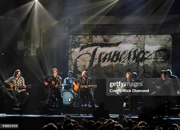 Musicians Vince Gill and Chris Daughtry of Daughtry performs onstage during the 43rd Annual CMA Awards at the Sommet Center on November 11, 2009 in...