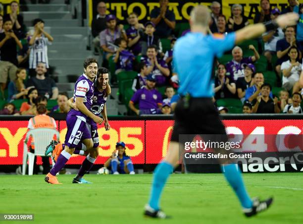 Jacob Italiano congratulates Joel Chianese of the Glory after he scored during the round 22 A-League match between the Perth Glory and the Central...