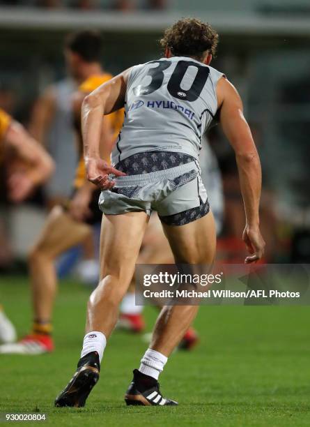 Charlie Curnow of the Blues pulls up his shorts during the AFL 2018 JLT Community Series match between the Hawthorn Haws and the Carlton Blues at...