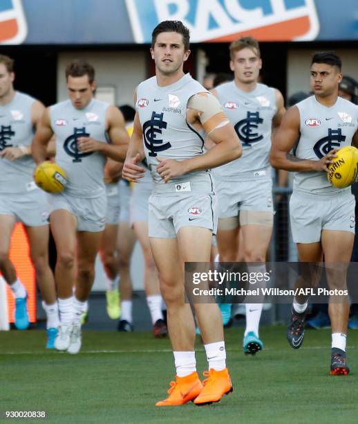 Marc Murphy of the Blues leads his team onto the field during the AFL 2018 JLT Community Series match between the Hawthorn Haws and the Carlton Blues...