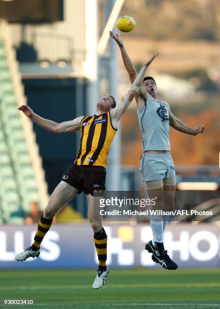 Ben McEvoy of the Hawks and Matthew Kreuzer of the Blues compete in a ruck contest during the AFL 2018 JLT Community Series match between the...