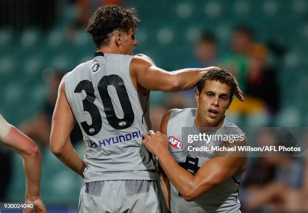 Ed Curnow and Charlie Curnow of the Blues celebrate during the AFL 2018 JLT Community Series match between the Hawthorn Haws and the Carlton Blues at...