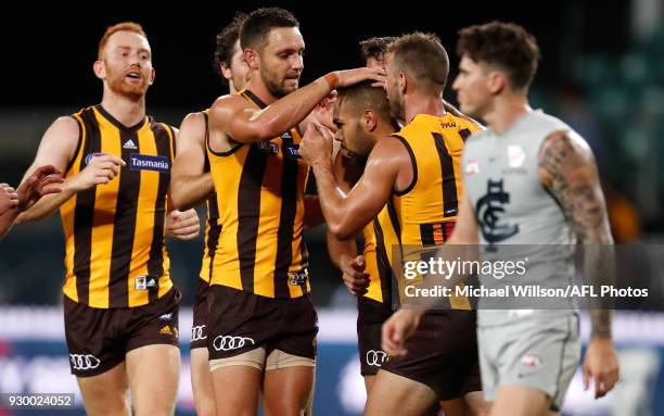 Jarman Impey of the Hawks celebrates a goal with teammates during the AFL 2018 JLT Community Series match between the Hawthorn Haws and the Carlton...