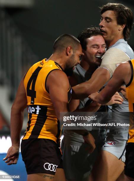 Jarman Impey of the Hawks and Jed Lamb of the Blues clash during the AFL 2018 JLT Community Series match between the Hawthorn Haws and the Carlton...