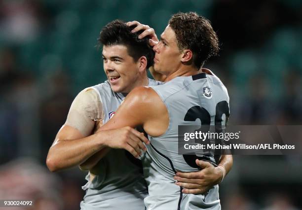 Matthew Kennedy and Charlie Curnow of the Blues celebrate during the AFL 2018 JLT Community Series match between the Hawthorn Haws and the Carlton...