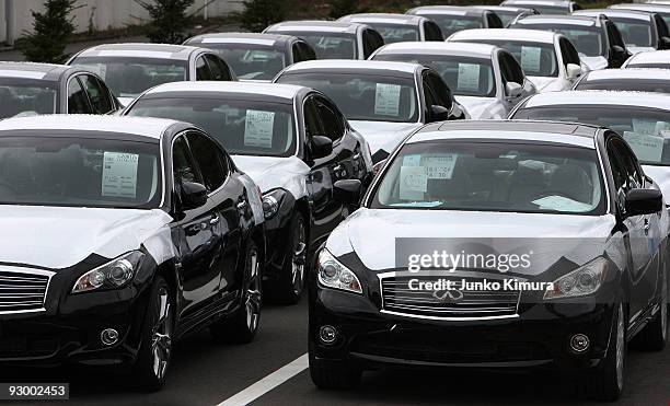 Newly built motor cars are lined up at Nissan's Tochigi Plant as Nissan announce the opening of the latest FUGA motor car production line on November...
