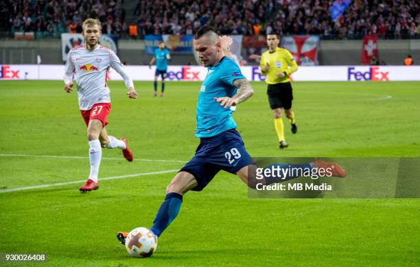 Europa League Round of 16, First leg. Football match at RB Arena: RB Leipzig 2 - 1 Zenit . RB Leipzig's Konrad Laimer and Zenit St Petersburg's Anton...