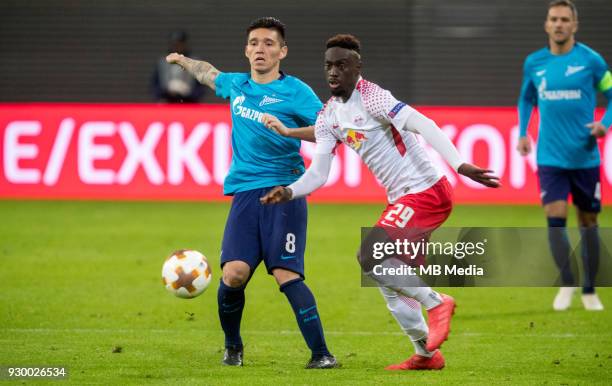 Europa League Round of 16, First leg. Football match at RB Arena: RB Leipzig 2 - 1 Zenit . Zenit St Petersburg's Matias Kranevitter and RB Leipzig's...