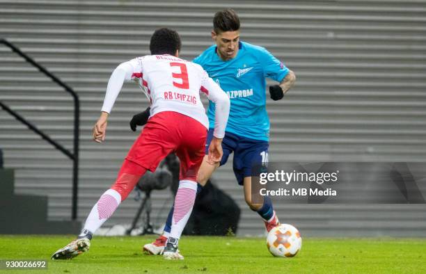 Europa League Round of 16, First leg. Football match at RB Arena: RB Leipzig 2 - 1 Zenit . RB Leipzig's Bernardo and Zenit St Petersburg's Emiliano...