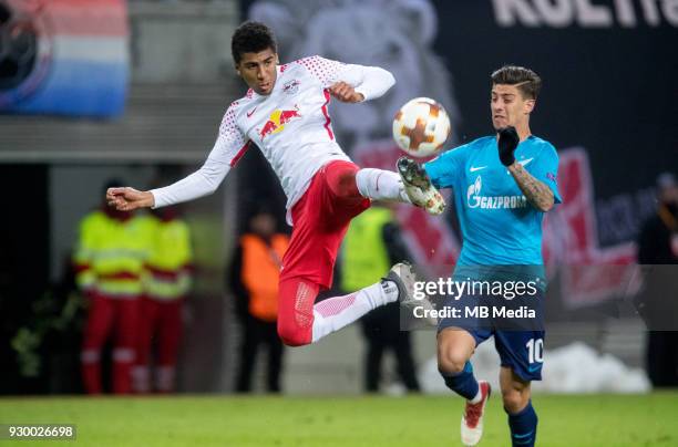 Europa League Round of 16, First leg. Football match at RB Arena: RB Leipzig 2 - 1 Zenit . RB Leipzig's Bernardo and Zenit St Petersburg's Emiliano...