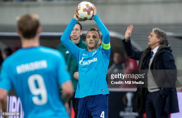 Europa League Round of 16, First leg. Football match at RB Arena: RB Leipzig 2 - 1 Zenit . Zenit St Petersburg's Domenico Criscito and Zenit St...