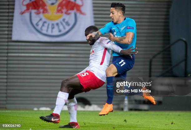 Europa League Round of 16, First leg. Football match at RB Arena: RB Leipzig 2 - 1 Zenit . RB Leipzig's Dayot Upamecano and Zenit St Petersburg's...