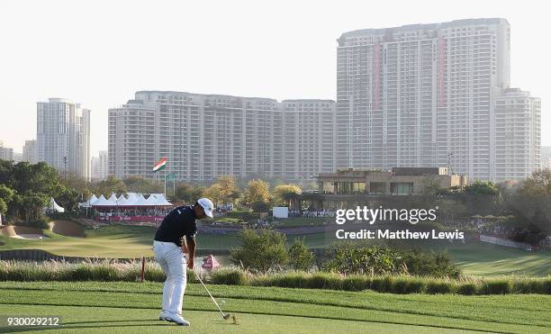Shubhankar Sharma of India plays his second shot from the 18th fairway during day three of the Hero Indian Open at Dlf Golf and Country Club on March...