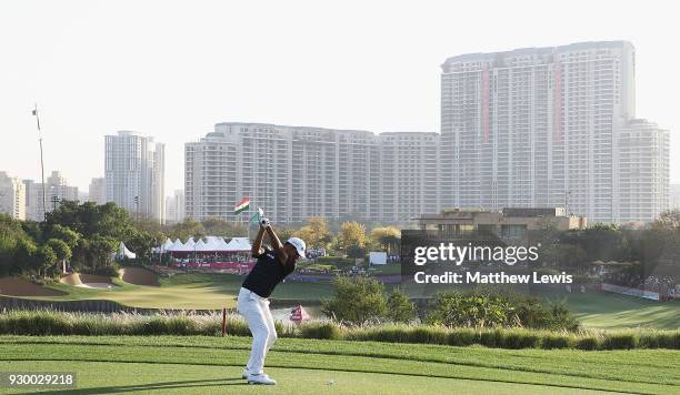 Shubhankar Sharma of India plays his second shot from the 18th fairway during day three of the Hero Indian Open at Dlf Golf and Country Club on March...