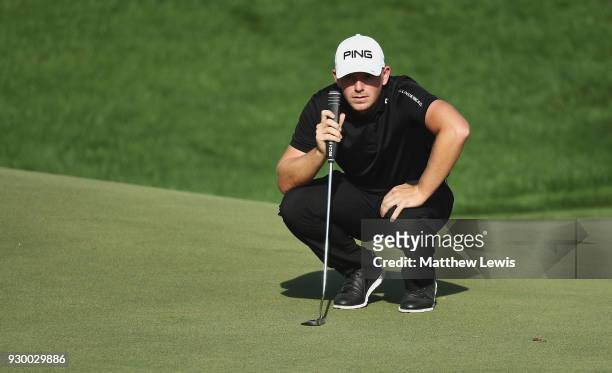 Matt Wallace of England lines up a putt on the 15th hole during day three of the Hero Indian Open at Dlf Golf and Country Club on March 10, 2018 in...