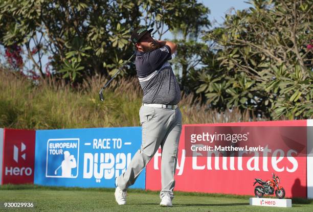 Andrew Johnston of England tees offon the 16th hole during day three of the Hero Indian Open at Dlf Golf and Country Club on March 10, 2018 in New...