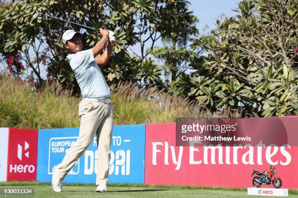 Sihwan Kim of the United States tees off on the 16th hole during day three of the Hero Indian Open at Dlf Golf and Country Club on March 10, 2018 in...