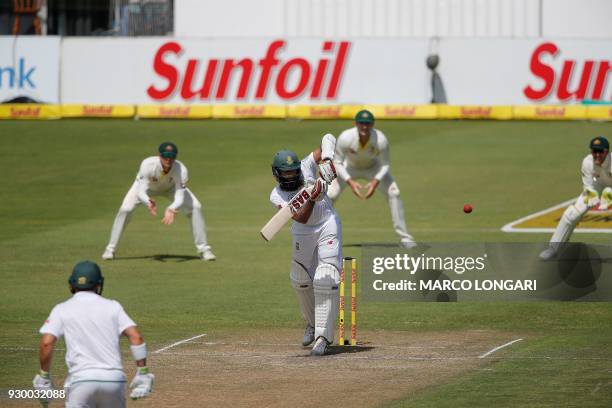 South Africa's batsman, Hashim Amla plays a shot during day two of the second Sunfoil Cricket Test match between South Africa and Australia at St...