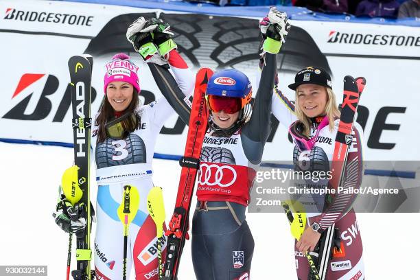 Wendy Holdener of Switzerland takes 2nd place, Mikaela Shiffrin of USA takes 1st place, Frida Hansdotter of Sweden takes 3rd place during the Audi...