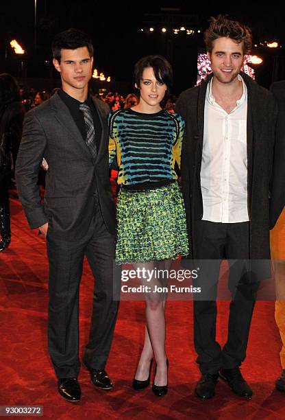 Actors Taylor Lautner, Kristen Stewart and Robert Pattinson attend "The Twilight Saga: New Moon" UK fan event at Battersea Evolution on November 10,...