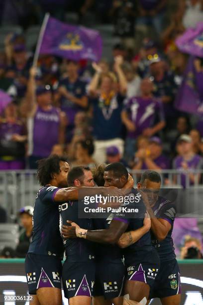The Storm celebrate a try during the round one NRL match between the Canterbury Bulldogs and the Melbourne Storm at Optus Stadium on March 10, 2018...