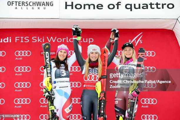 Wendy Holdener of Switzerland takes 2nd place, Mikaela Shiffrin of USA takes 1st place, Frida Hansdotter of Sweden takes 3rd place during the Audi...