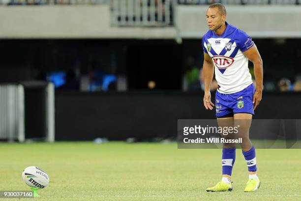 Moses Mbye of the Bulldogs lines up a conversion during the round one NRL match between the Canterbury Bulldogs and the Melbourne Storm at Optus...