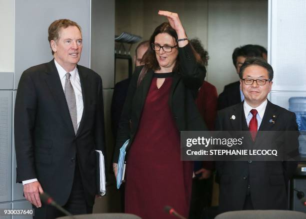 European Commissioner for Trade Cecilia Malmstrom , US trade representative Robert Lighthizer and Japan's Economy Minister Hiroshige Seko arrive for...