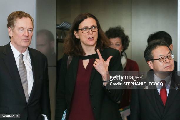 European Commissioner for Trade Cecilia Malmstrom , US trade representative Robert Lighthizer and Japan's Economy Minister Hiroshige Seko arrive for...