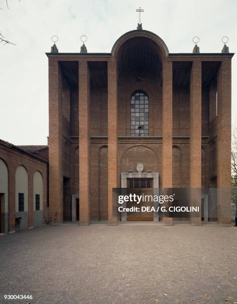 The facade of Saint Ambrose Church designed by Giovanni Muzio , Cremona, Lombardy, Italy, 20th century.