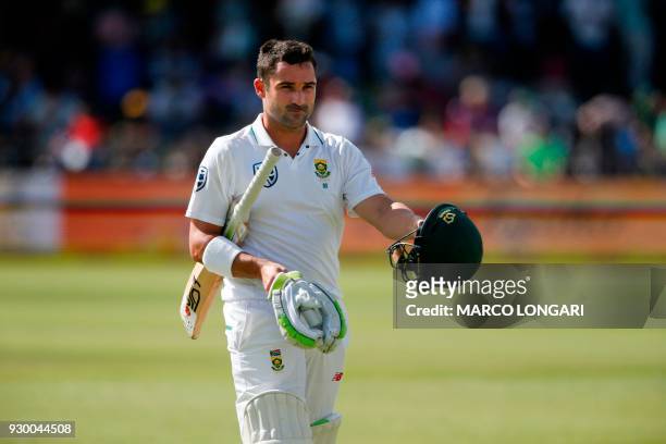 South Africa's batsman Dean Elgar leaves the ground after having been dismissed by Australia bowler Josh Hazlewood during day two of the second...
