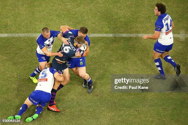 Of the Storm gets tackled during the round one NRL match between the Canterbury Bulldogs and the Melbourne Storm at Optus Stadium on March 10, 2018...