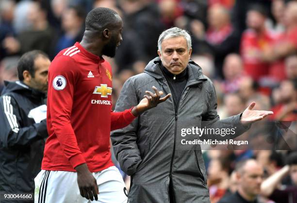 Romelu Lukaku of Manchester United speaks with Jose Mourinho during the Premier League match between Manchester United and Liverpool at Old Trafford...