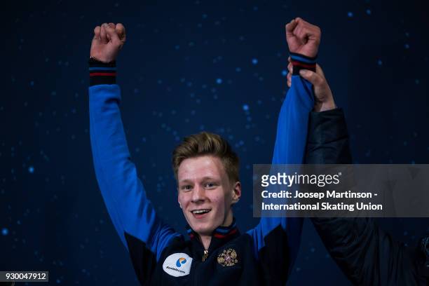 Alexey Erokhov of Russia reacts at the kiss and cry in the Junior Men's Free Skating during the World Junior Figure Skating Championships at Arena...