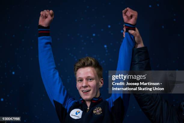 Alexey Erokhov of Russia reacts at the kiss and cry in the Junior Men's Free Skating during the World Junior Figure Skating Championships at Arena...