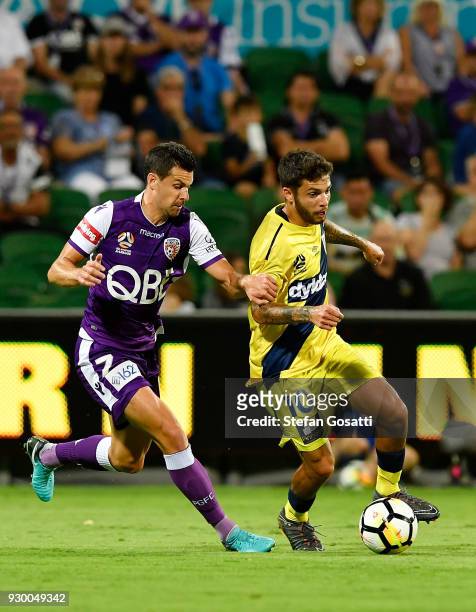 Joel Chianese of the Glory and Danny De Silva of the Mariners compete for the ball during the round 22 A-League match between the Perth Glory and the...